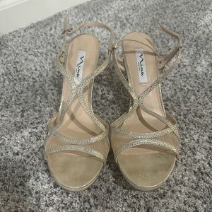 Never worn size 10 gold heels.